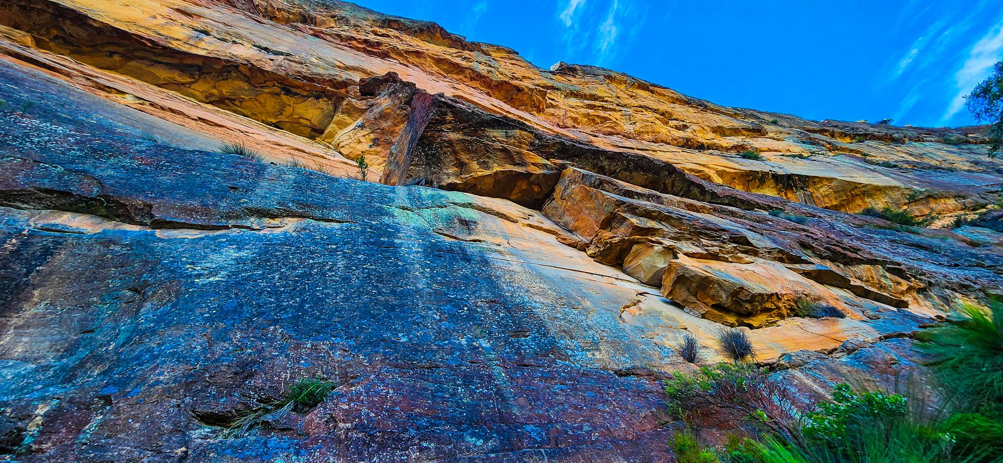 Towering sandstone cliffs along Colliers Causeway